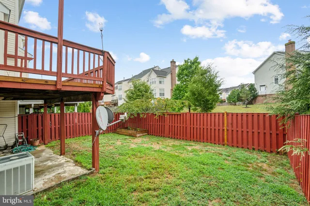 a view of a backyard with a slide