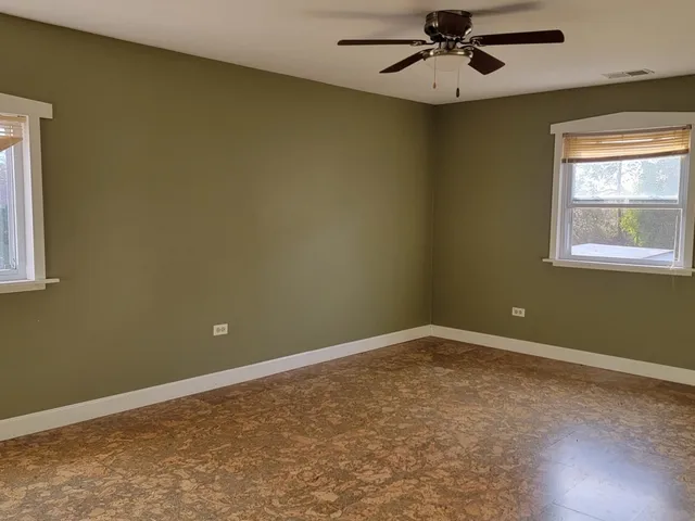 an empty room and window