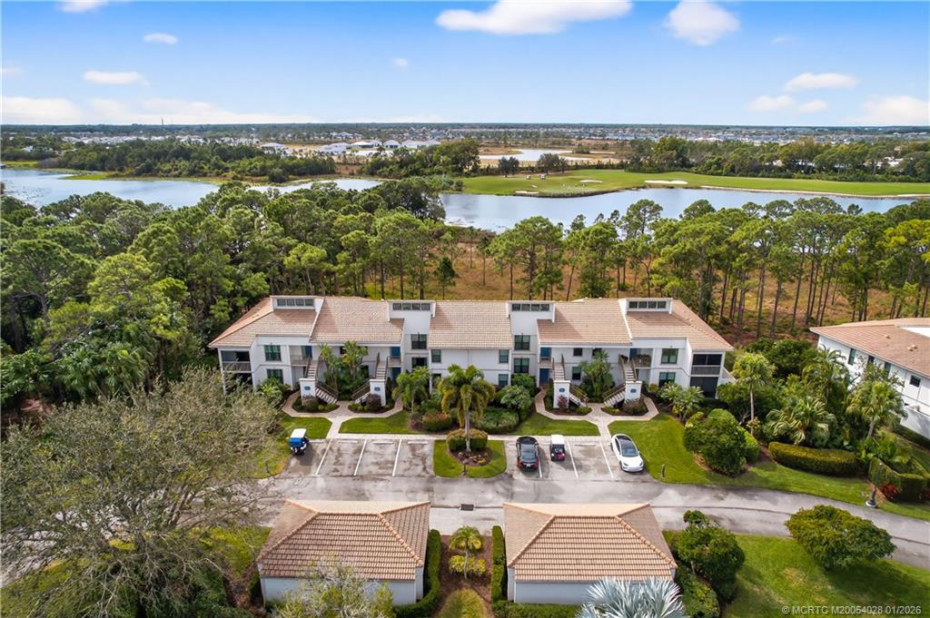 13204 Harbour Ridge Boulevard, Unit 2A Palm City, FL 34990 - Photo 30 of 38 an aerial view of a houses with lake view