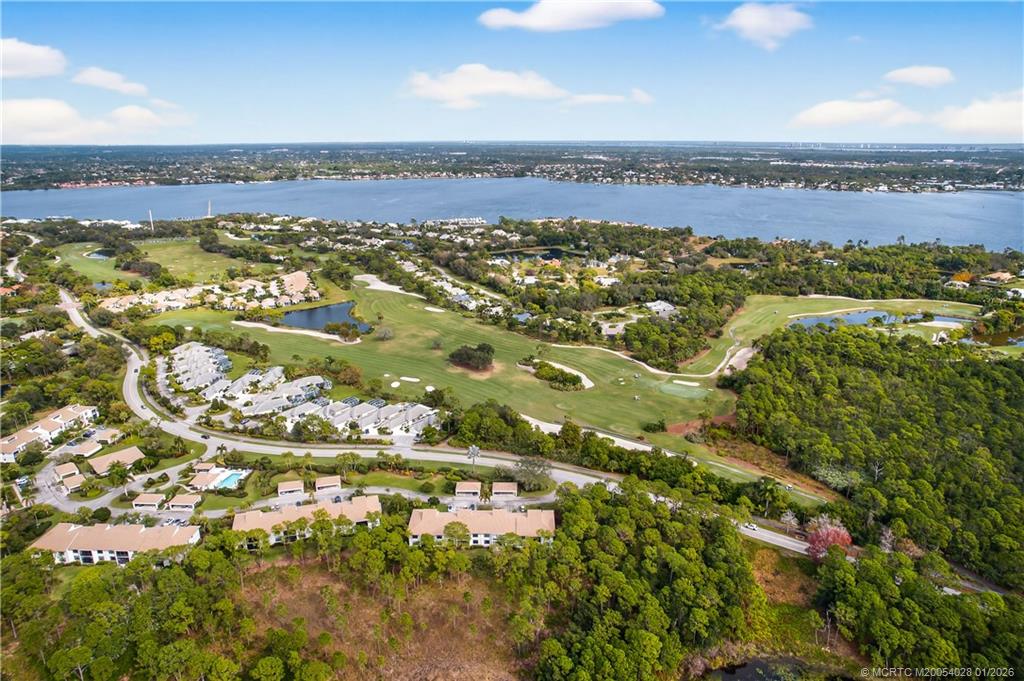 13204 Harbour Ridge Boulevard, Unit 2A Palm City, FL 34990 - Photo 35 of 38 a view of a city with an ocean