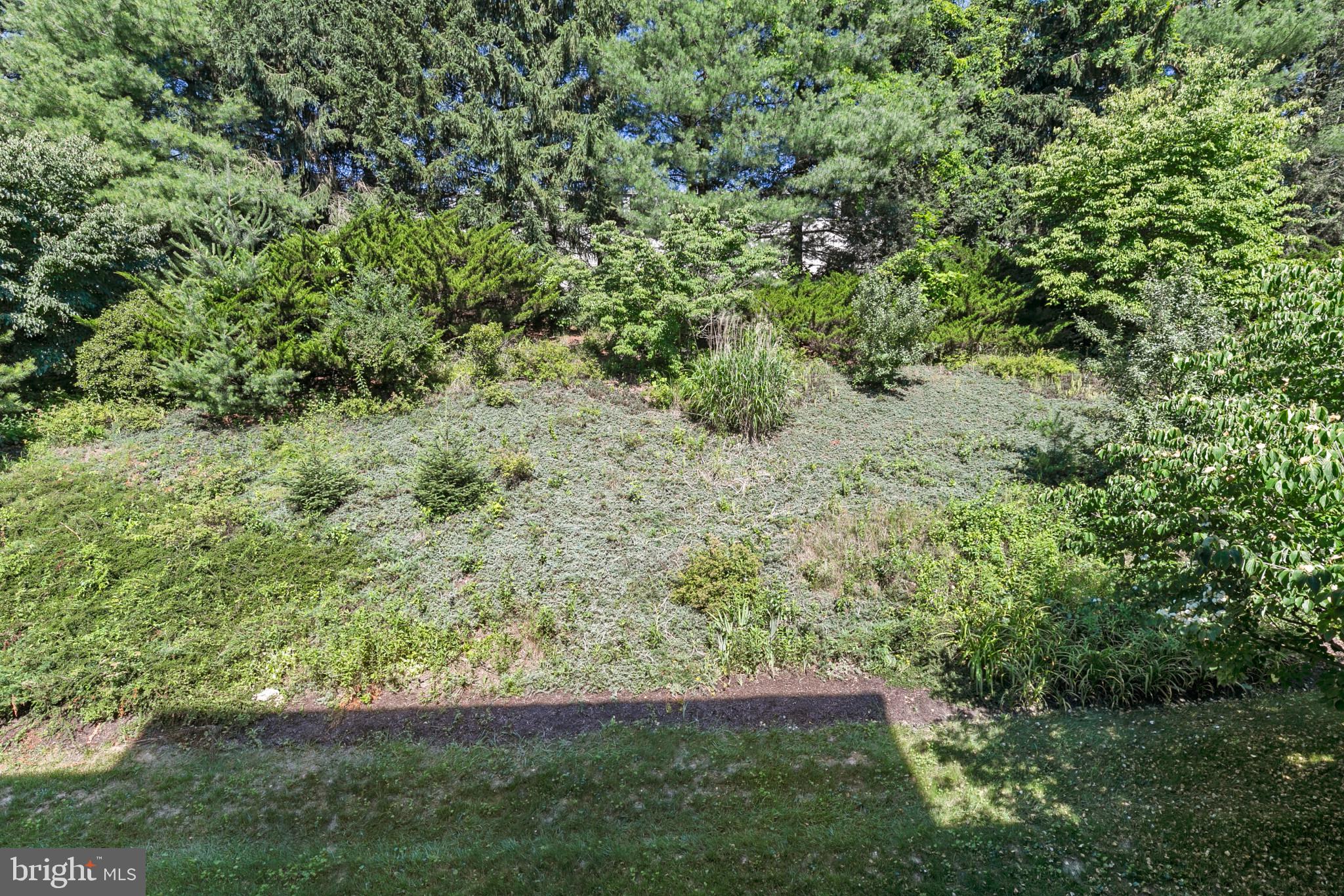 6504 Ridenour Way East, Unit 2C Sykesville, MD 21784 - Photo 19 of 32 a view of outdoor space and yard