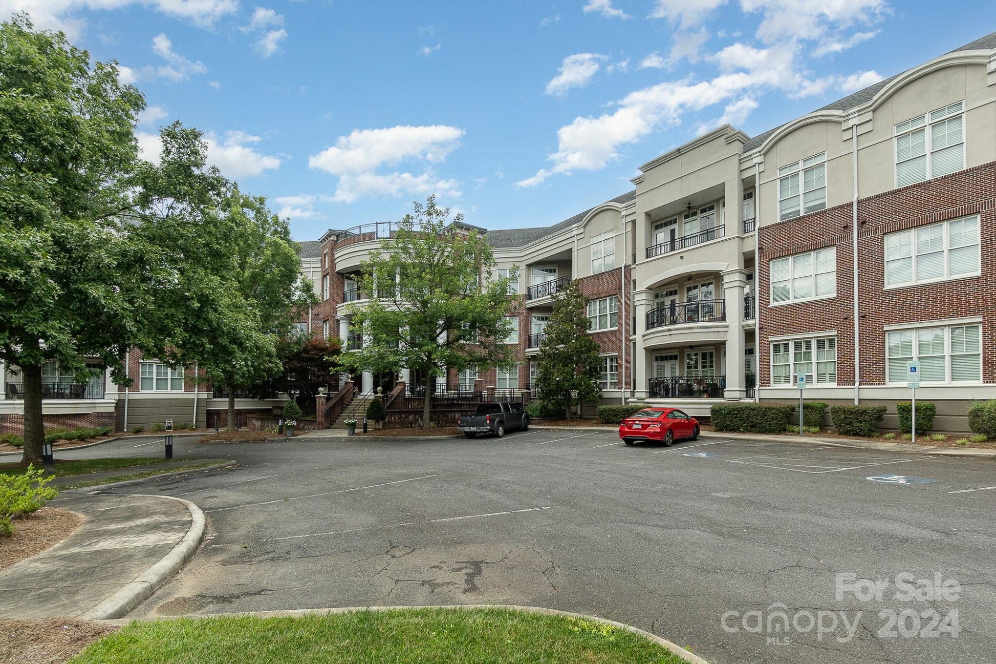 a front view of a building with street view