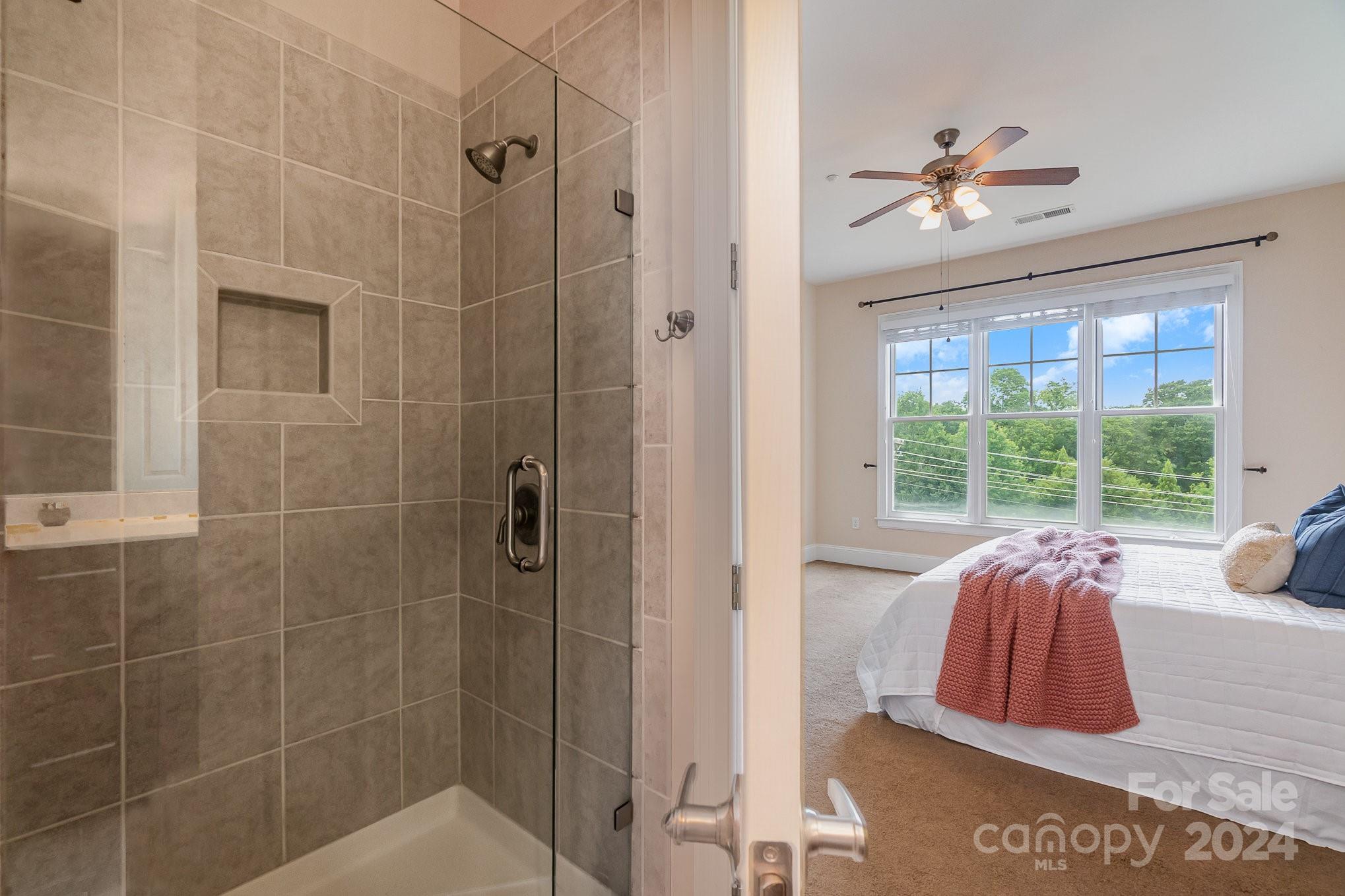 5425 Closeburn Road, Unit 213 Charlotte, NC 28210 - Photo 21 of 32 a view of bathroom with tub window and outdoor space