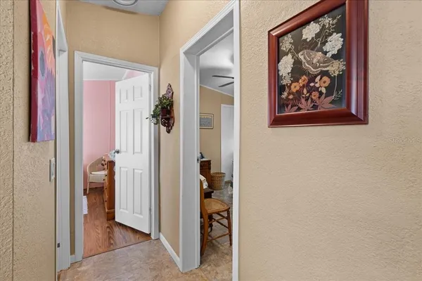 a bedroom with a bed dresser and a window
