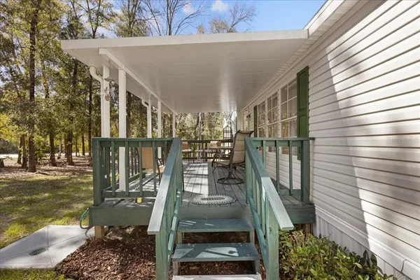 a view of pathway with yard