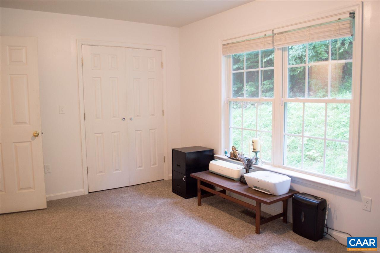 173 Top Ridge Road Stanardsville, VA 22973 - Photo 20 of 40 a living room with furniture and a window