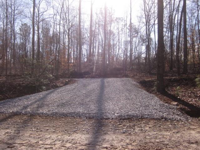 0 Bear Creek Road Talking Rock, GA 30175 - Photo 6 of 78 a view of a yard with trees in the background