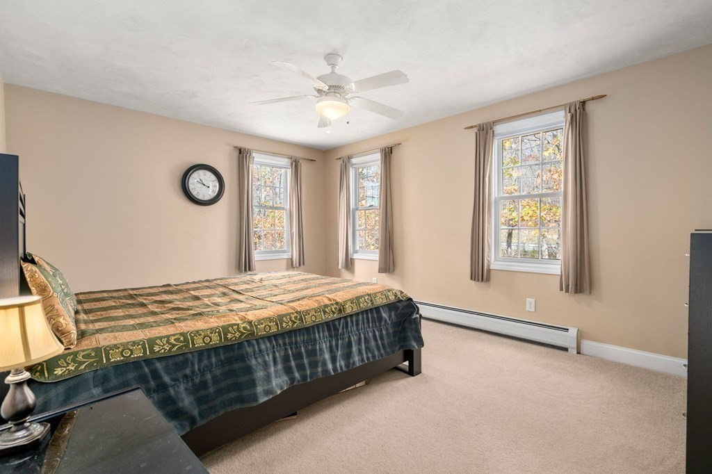 377 Main Street Rutland, MA 01543 - Photo 16 of 32 a bedroom with a bed and a window