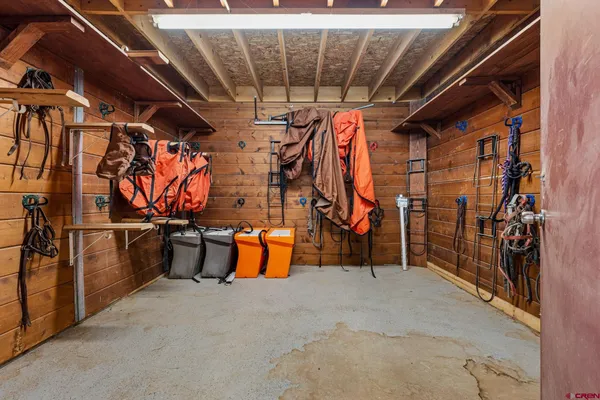 a bedroom with a bed furniture and a window
