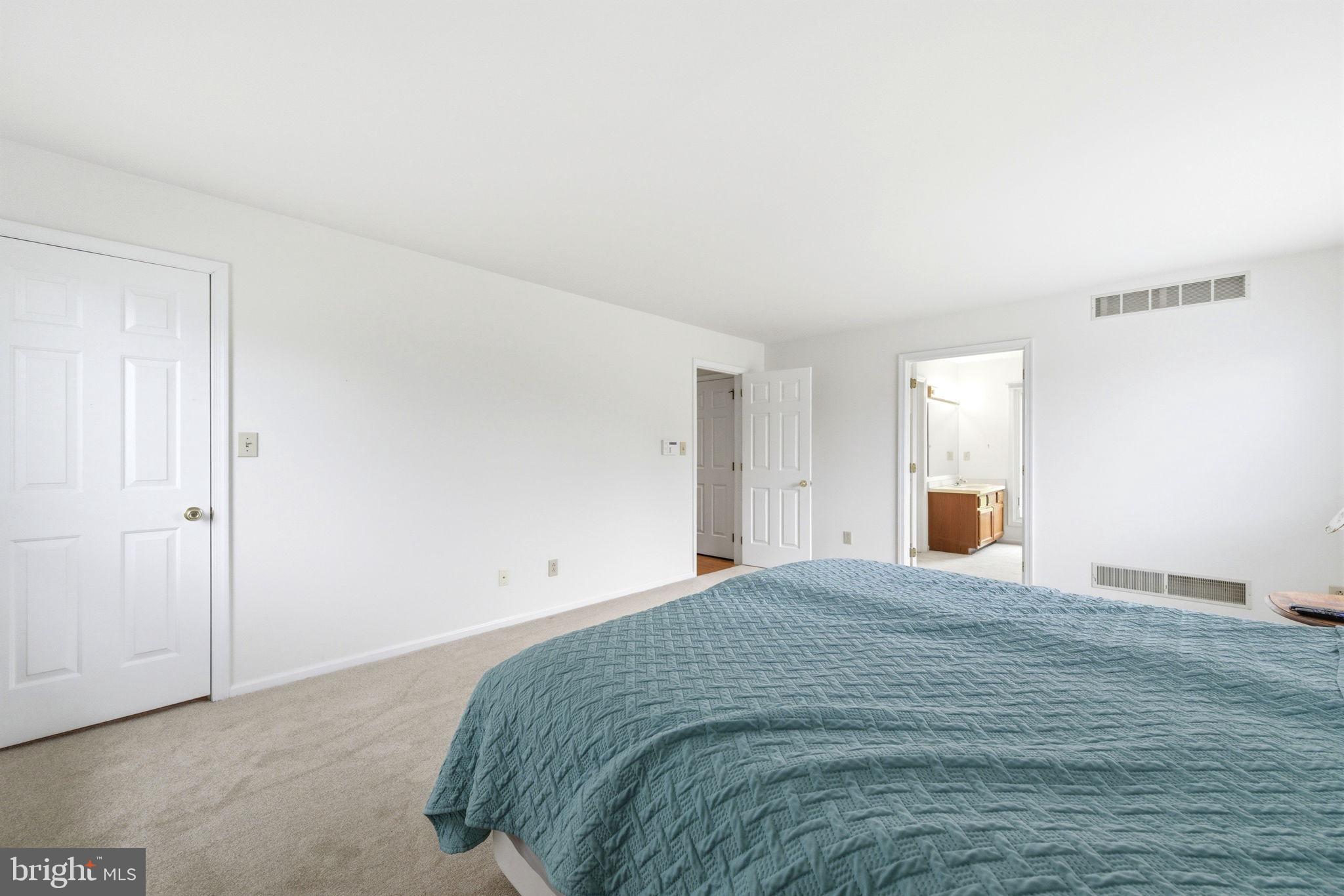 736 Letitia Drive Hockessin, DE 19707 - Photo 21 of 92 a bedroom with a bed and a window