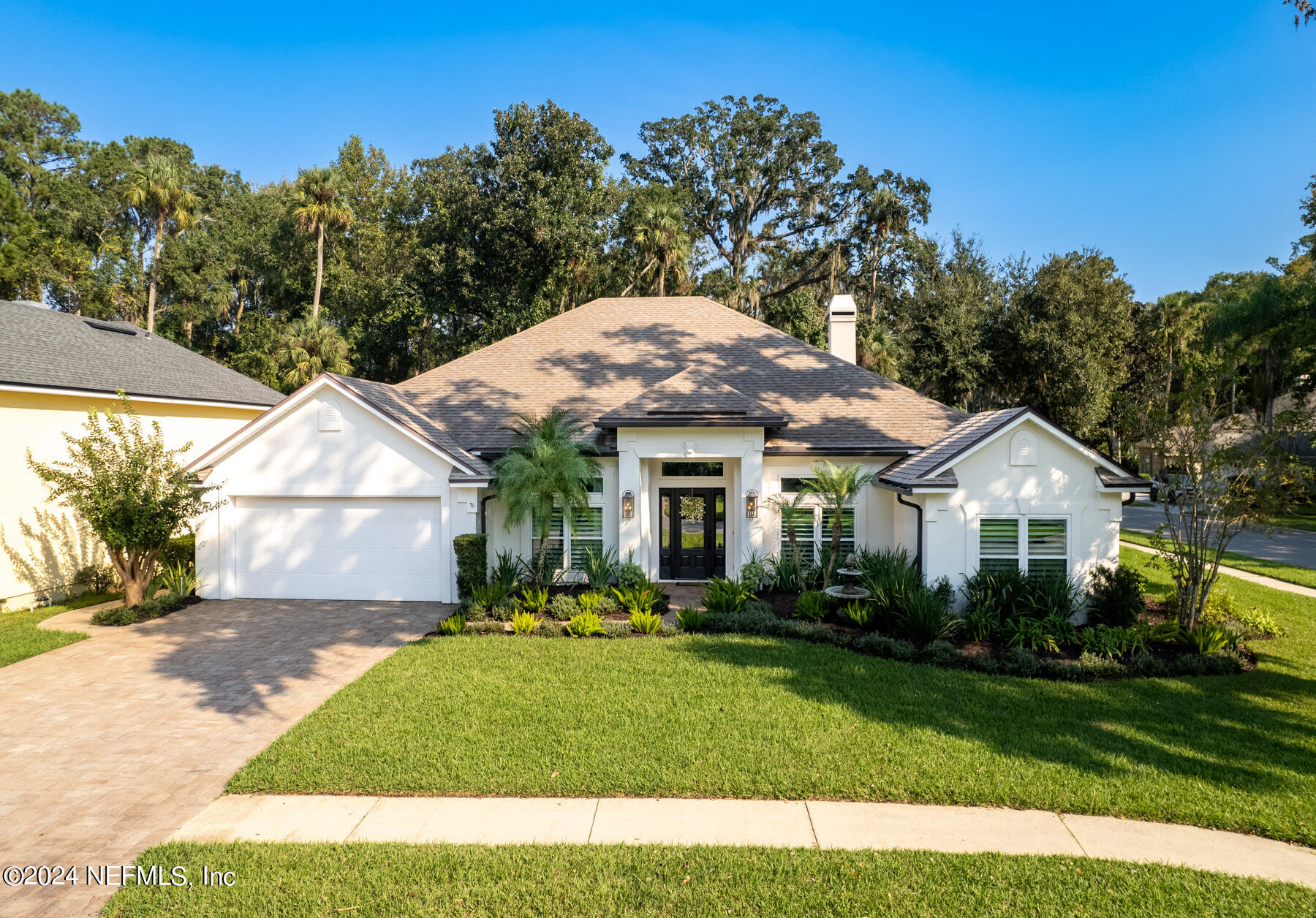 804 Mill Stream Road Ponte Vedra Beach, FL 32082 - Photo 2 of 67 a front view of a house with a yard