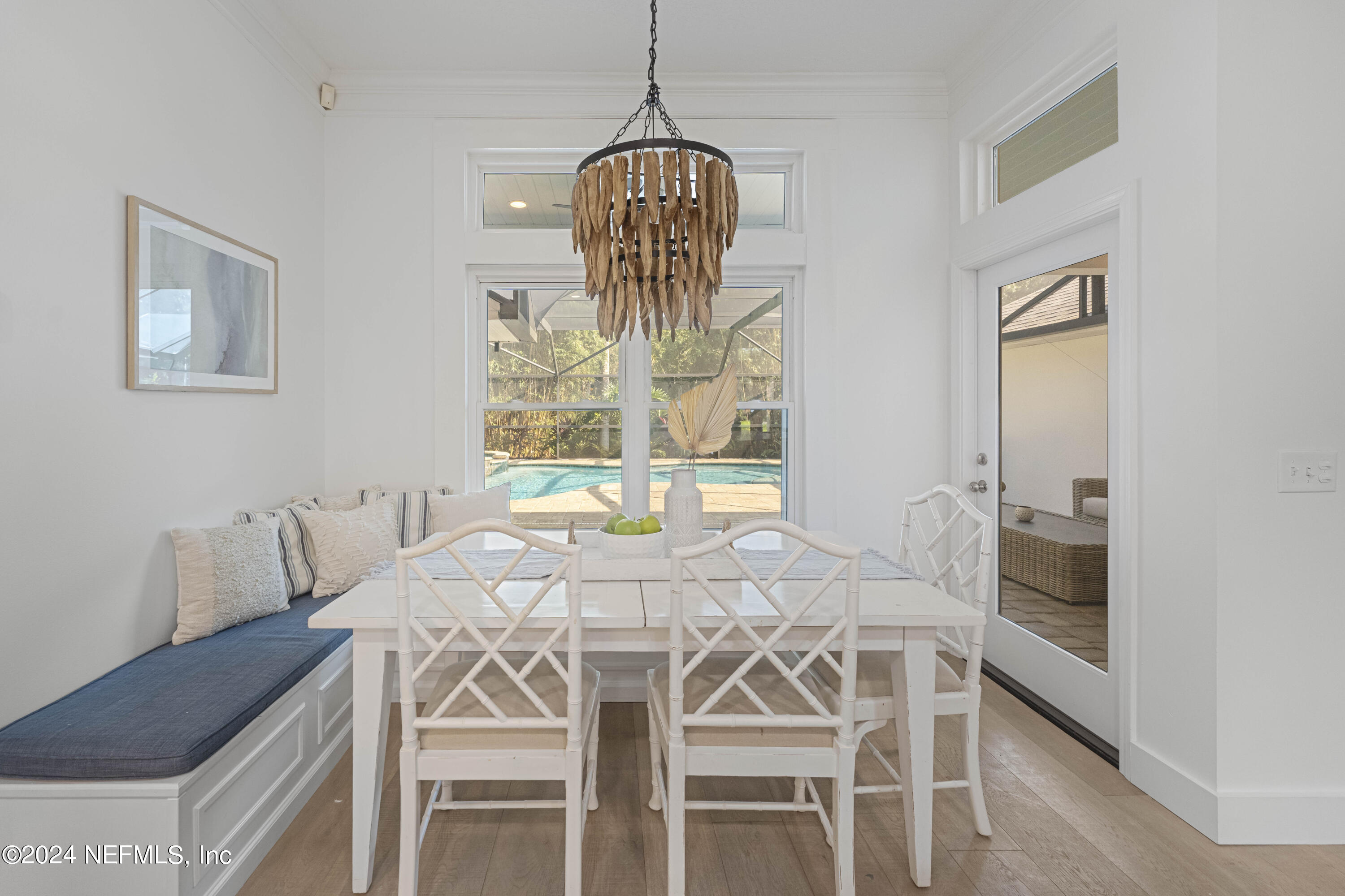 804 Mill Stream Road Ponte Vedra Beach, FL 32082 - Photo 25 of 67 a view of a dining room with furniture and wooden floor
