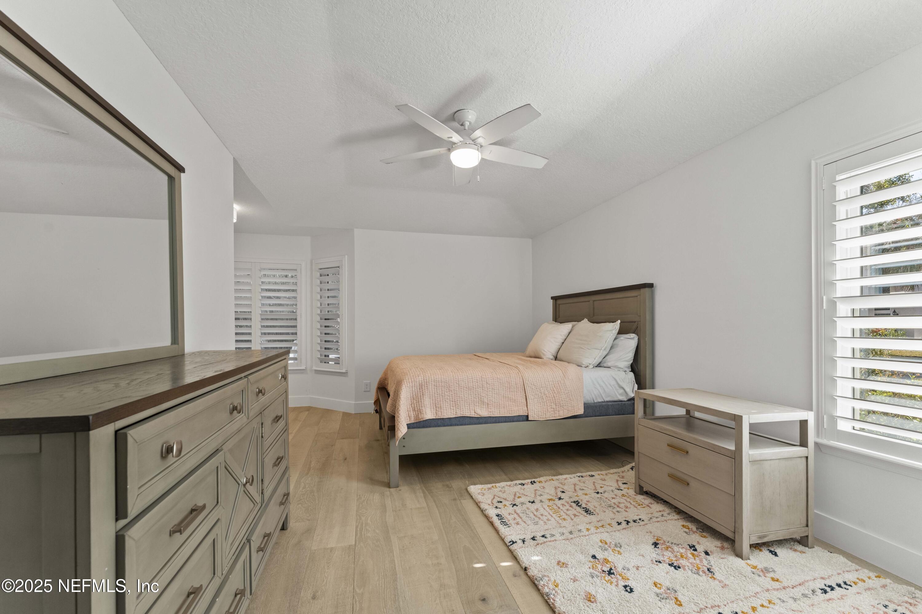 804 Mill Stream Road Ponte Vedra Beach, FL 32082 - Photo 31 of 67 a bed room with a bed and a window