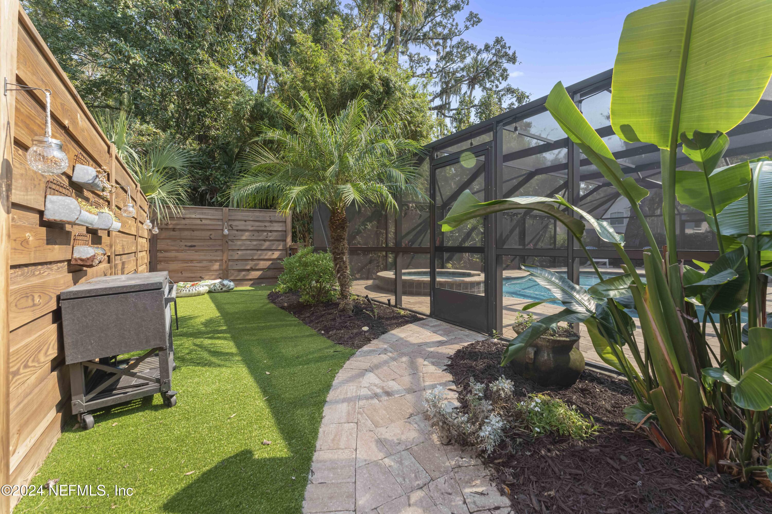 804 Mill Stream Road Ponte Vedra Beach, FL 32082 - Photo 4 of 67 a view of a backyard