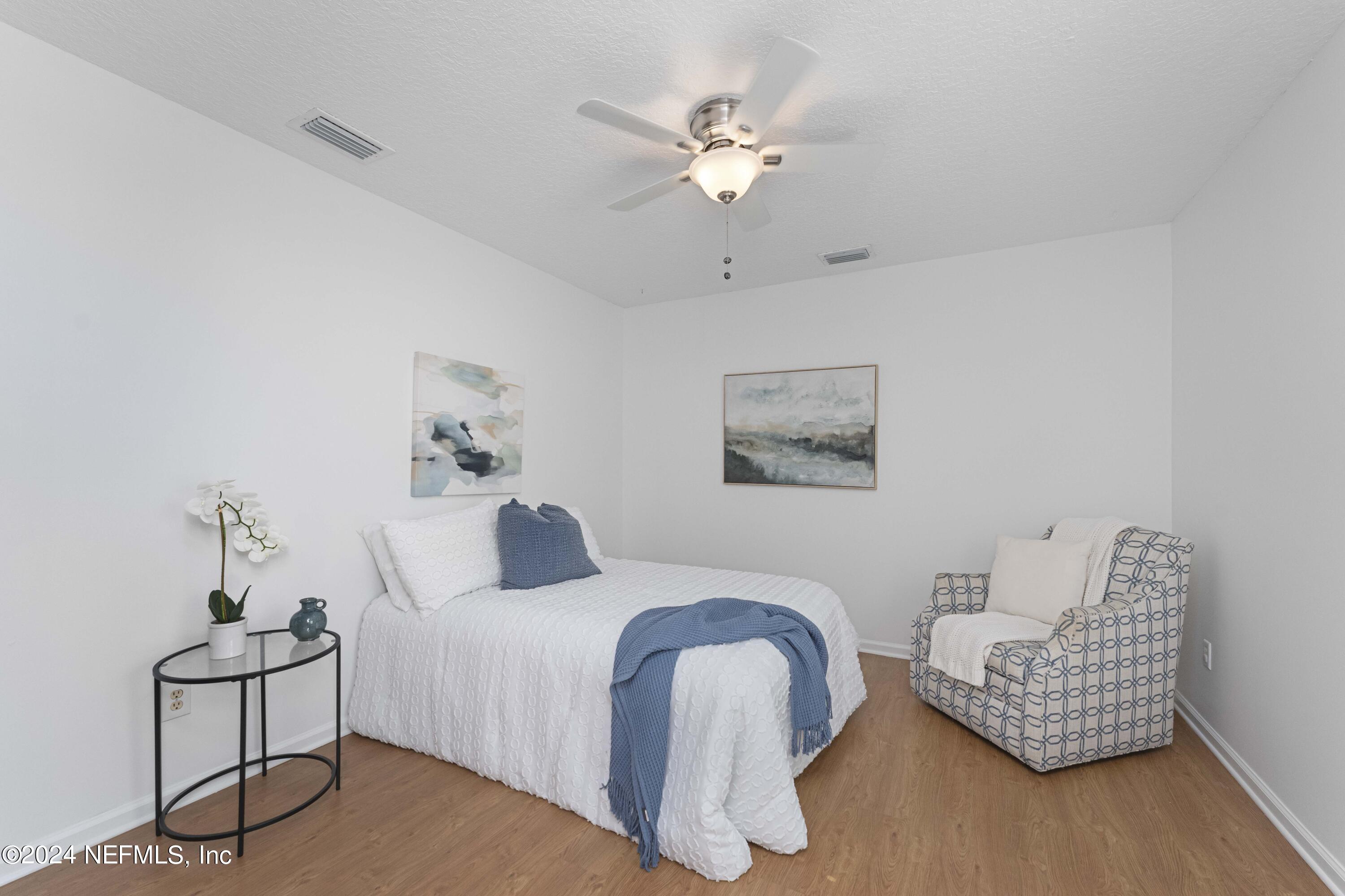 804 Mill Stream Road Ponte Vedra Beach, FL 32082 - Photo 41 of 67 a bedroom with bed and a couch
