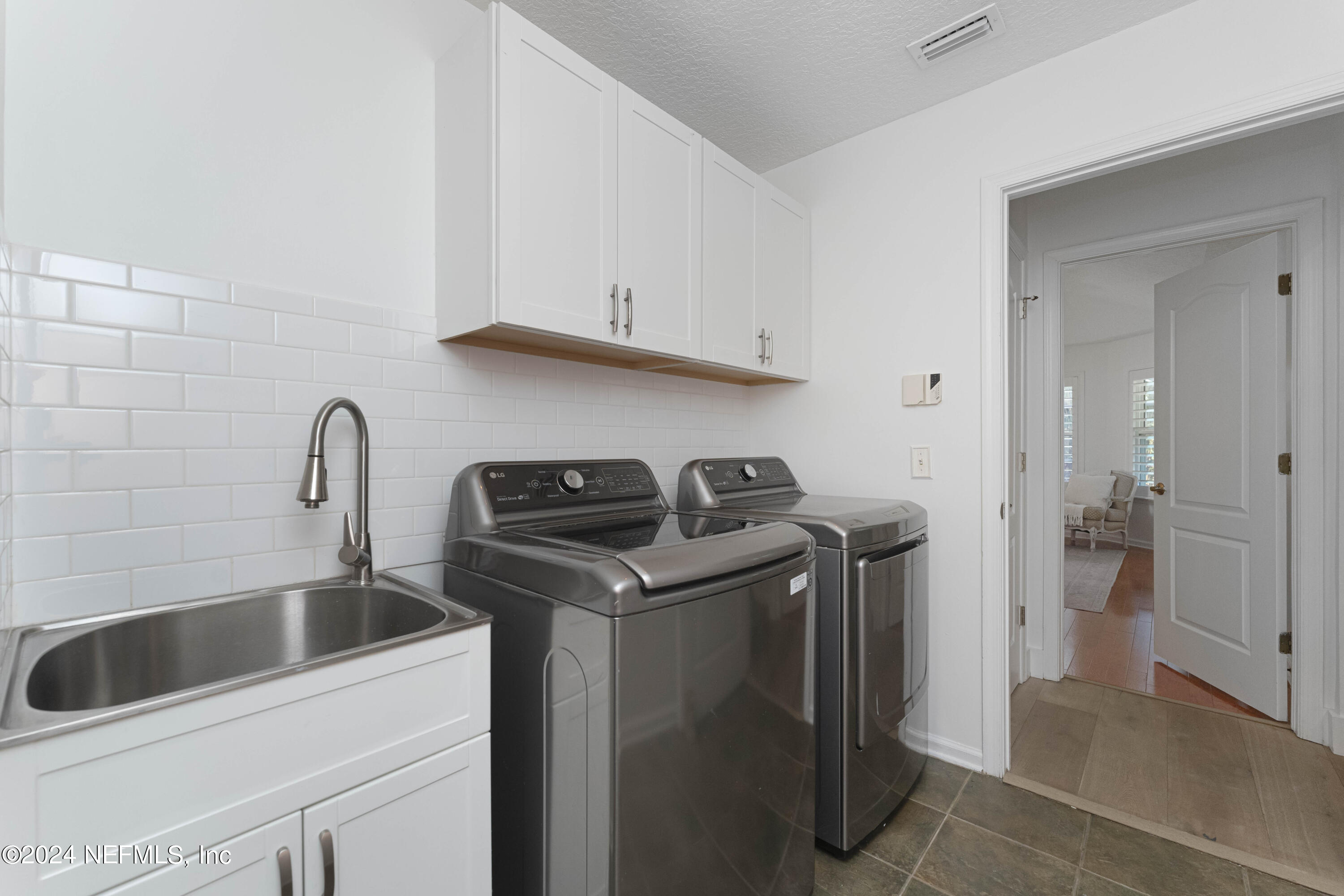 804 Mill Stream Road Ponte Vedra Beach, FL 32082 - Photo 42 of 67 a utility room with sink dryer and washer