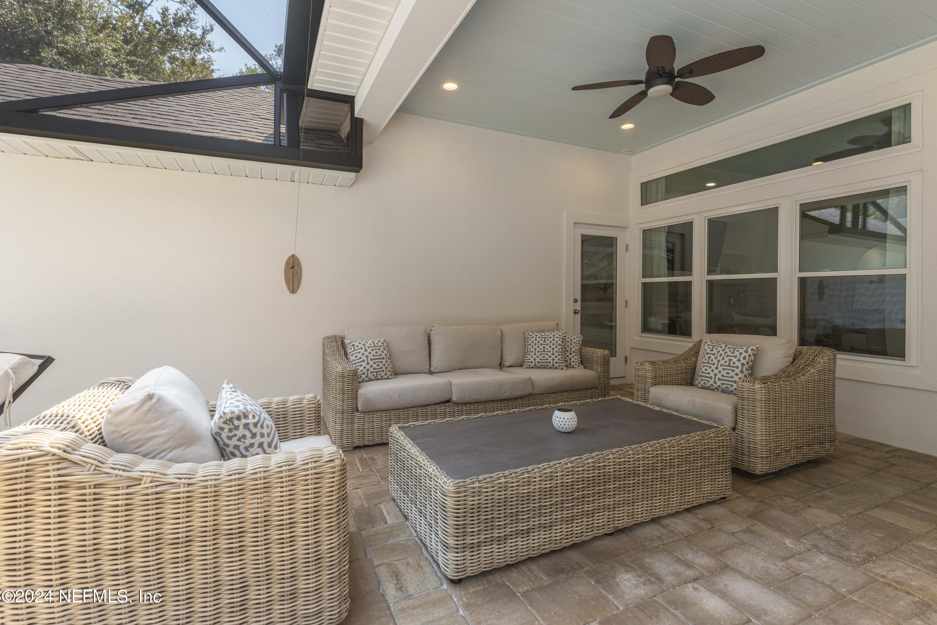 804 Mill Stream Road Ponte Vedra Beach, FL 32082 - Photo 44 of 67 a living room with furniture and a large window