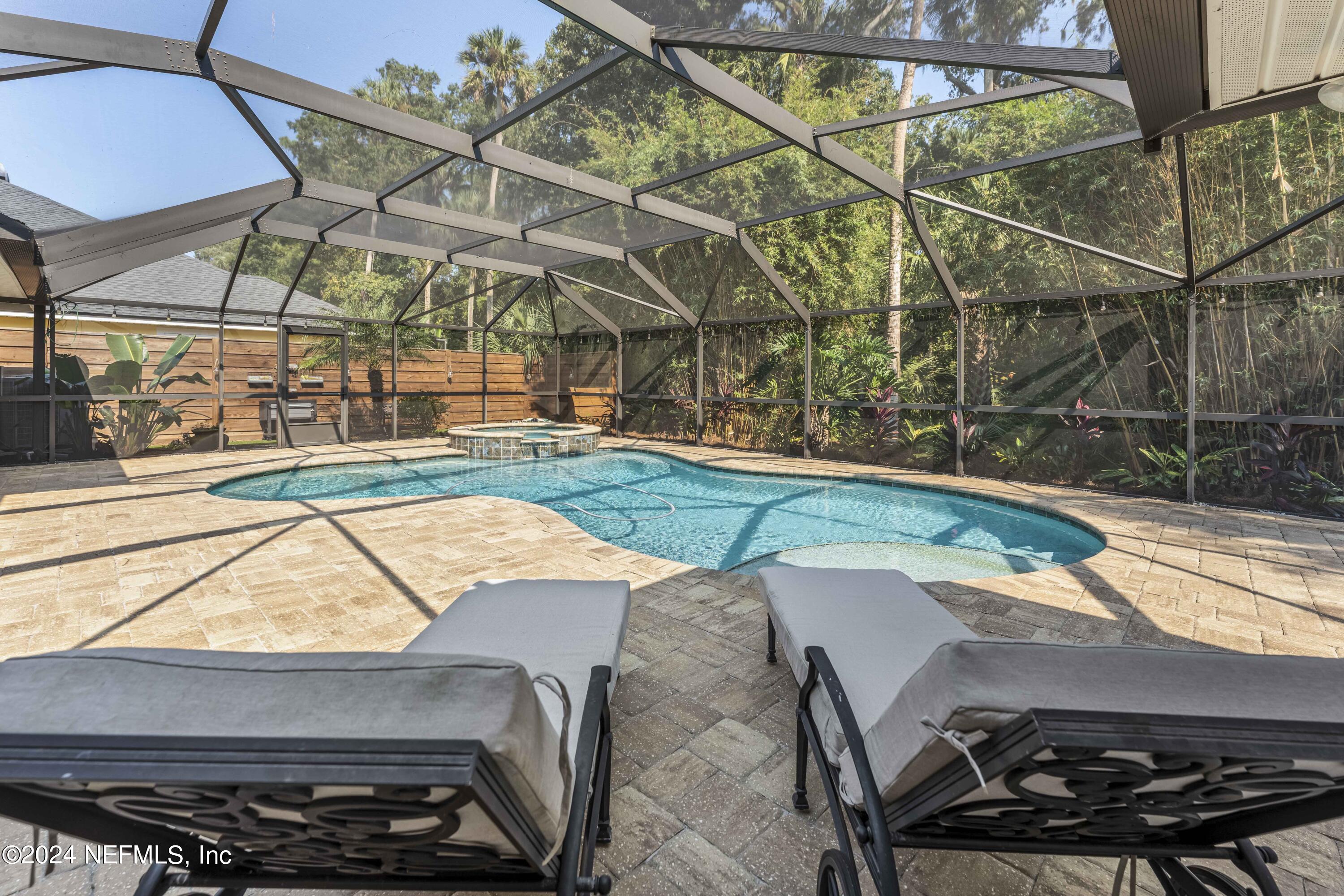 804 Mill Stream Road Ponte Vedra Beach, FL 32082 - Photo 45 of 67 a view of a backyard with sitting area