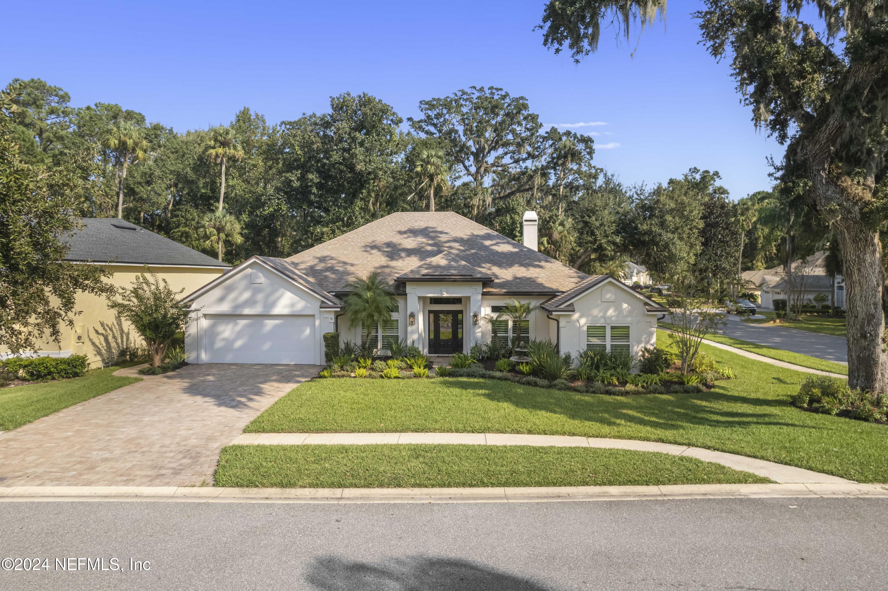 804 Mill Stream Road Ponte Vedra Beach, FL 32082 - Photo 53 of 67 a front view of a house with a yard