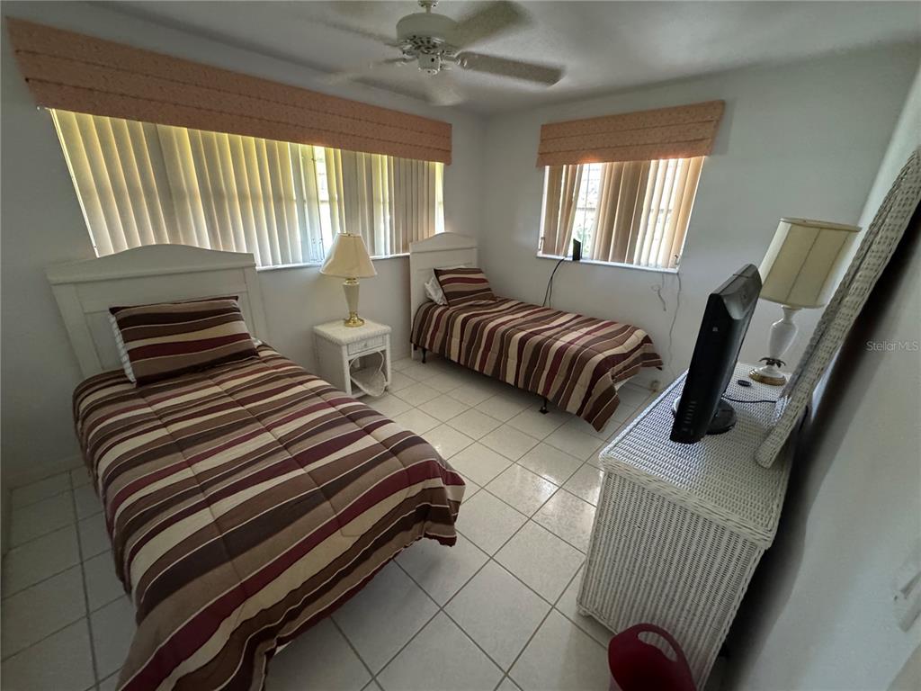 239 Hammock Terrace Venice, FL 34293 - Photo 12 of 13 a bedroom with furniture and a window