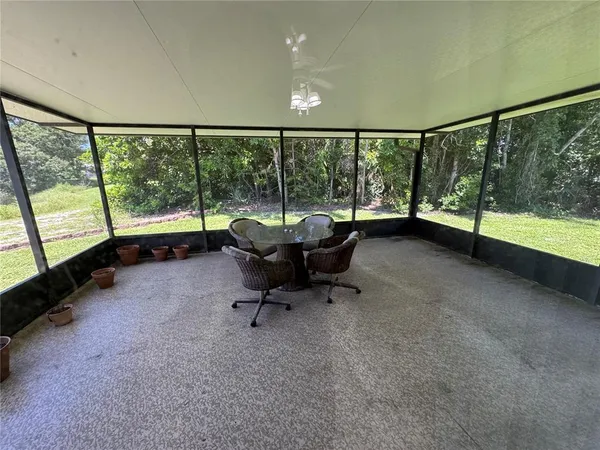 a living room with furniture and a couch