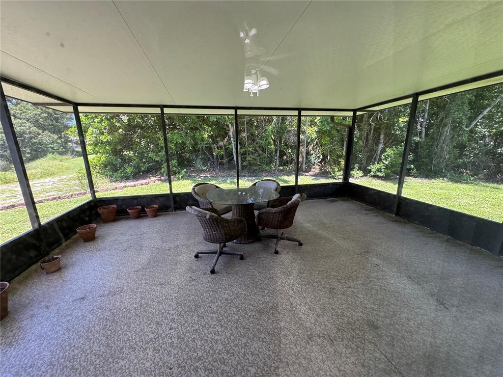 239 Hammock Terrace Venice, FL 34293 - Photo 7 of 13 a living room with furniture and a large window