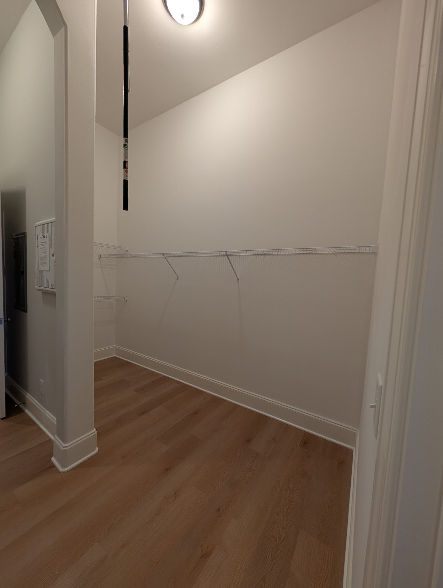 6135 Beckwith Road Mount Juliet, TN 37122 - Photo 13 of 33 an empty room with wooden floor