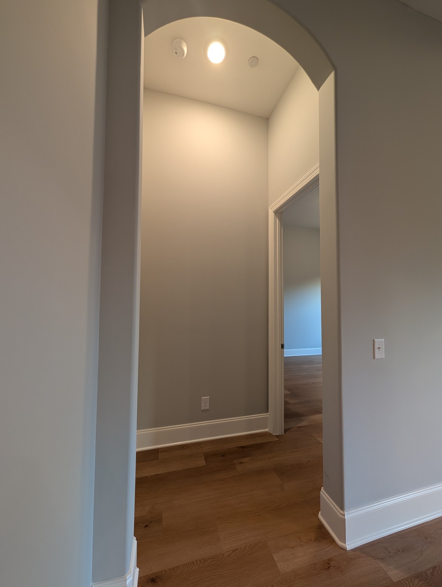 6135 Beckwith Road Mount Juliet, TN 37122 - Photo 21 of 33 an empty room with wooden floor and door