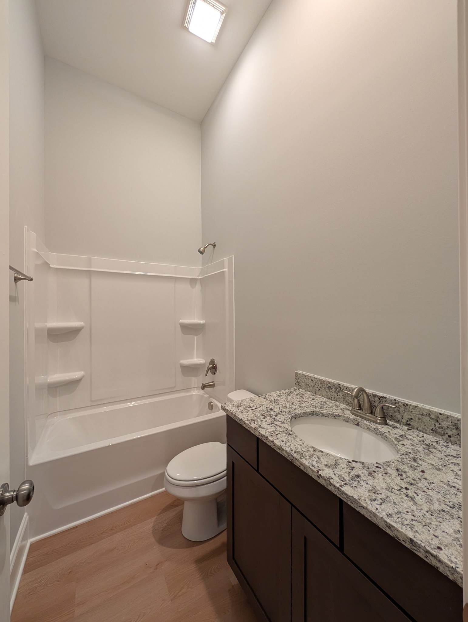 6135 Beckwith Road Mount Juliet, TN 37122 - Photo 28 of 33 a bathroom with a granite countertop sink toilet and shower