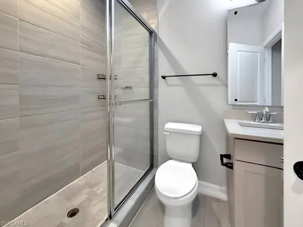 a bathroom with a sink a toilet and a bathtub