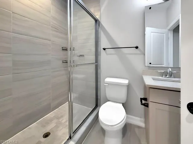 a bathroom with a sink a toilet and a bathtub