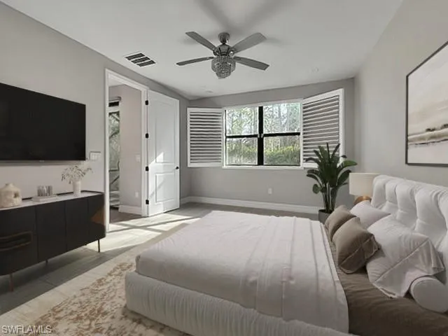 a bedroom with a bed and window