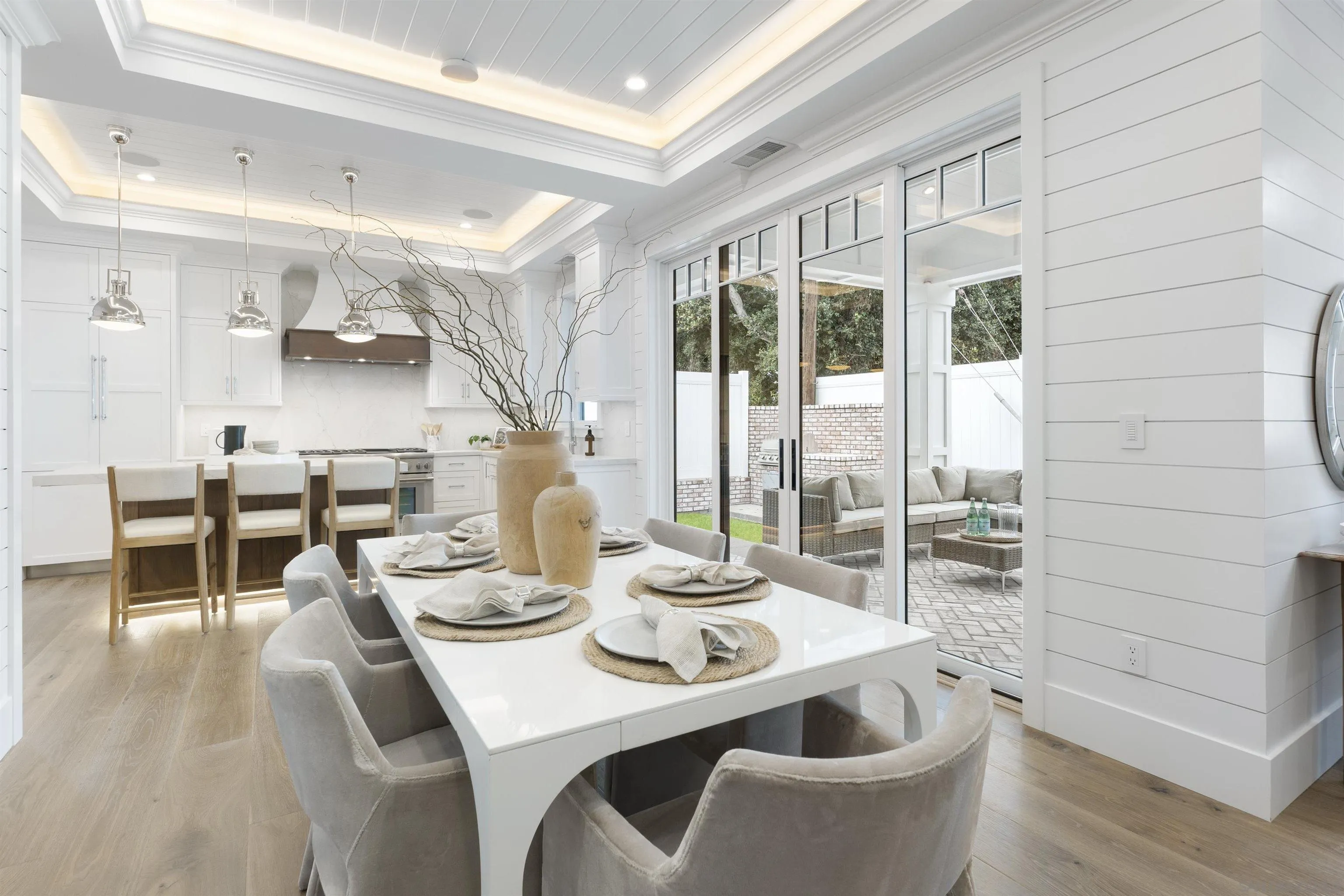 462 Westbourne Street La Jolla, CA 92037 - Photo 13 of 75 a dining room with furniture a chandelier and wooden floor