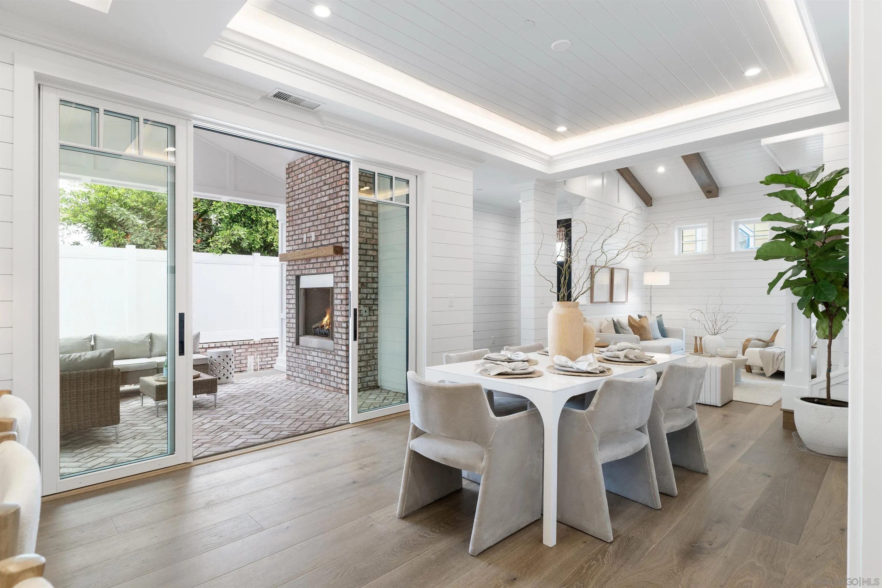 462 Westbourne Street La Jolla, CA 92037 - Photo 15 of 75 a view of a dining room with furniture window and wooden floor