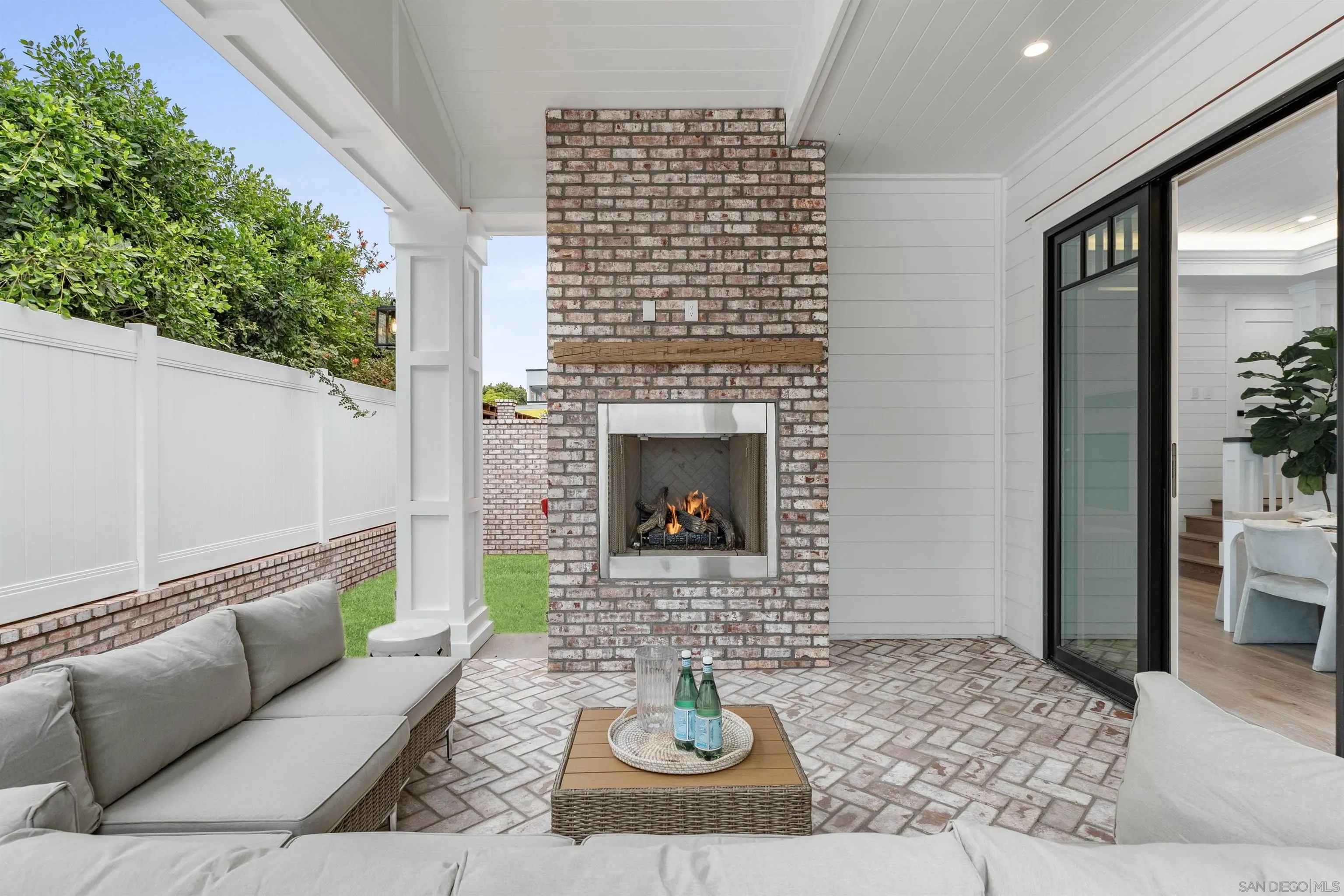 462 Westbourne Street La Jolla, CA 92037 - Photo 26 of 75 a living room with furniture and a fireplace