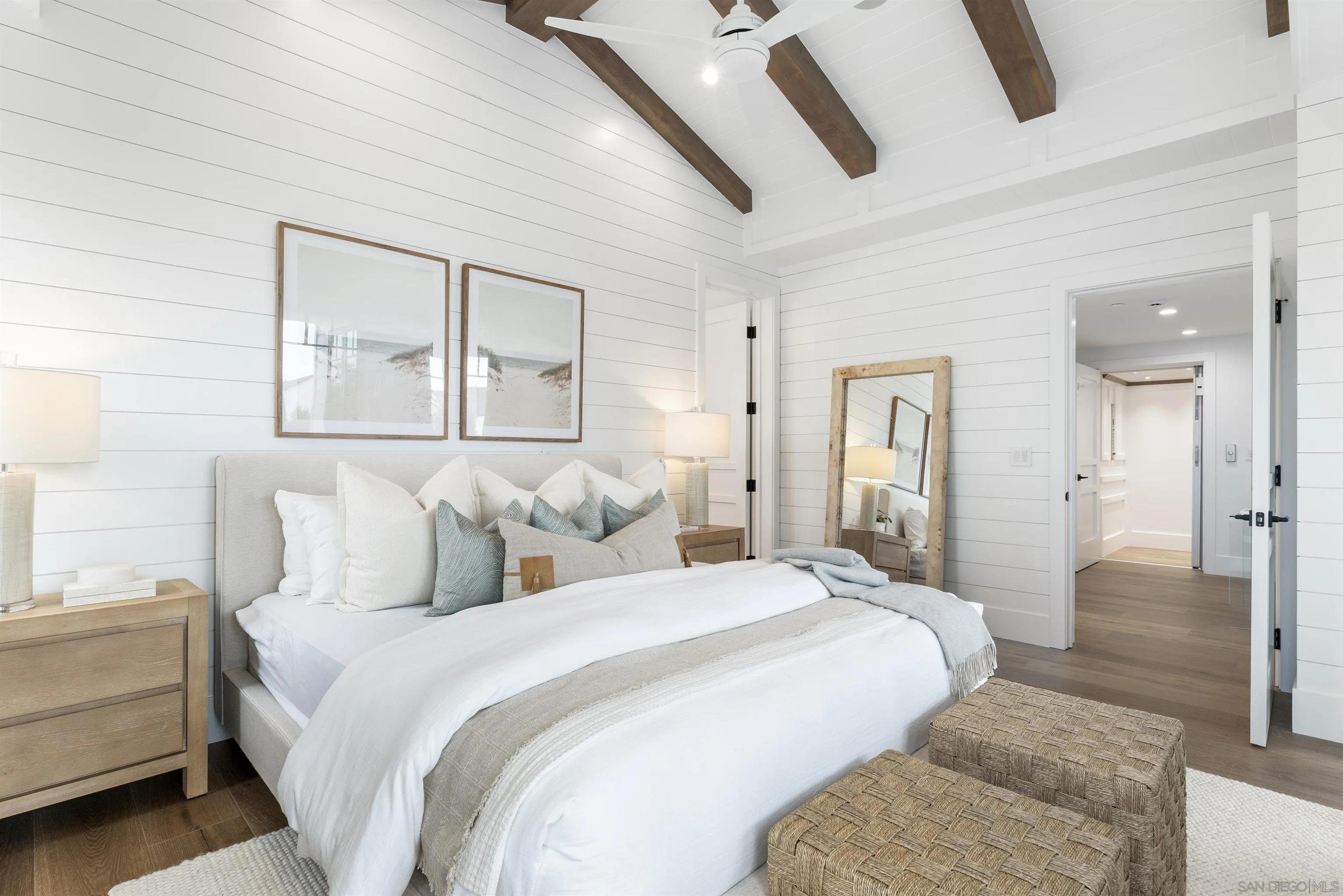 462 Westbourne Street La Jolla, CA 92037 - Photo 36 of 75 a bedroom with a bed and a chandelier