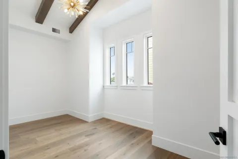 a utility room with sink dryer and washer