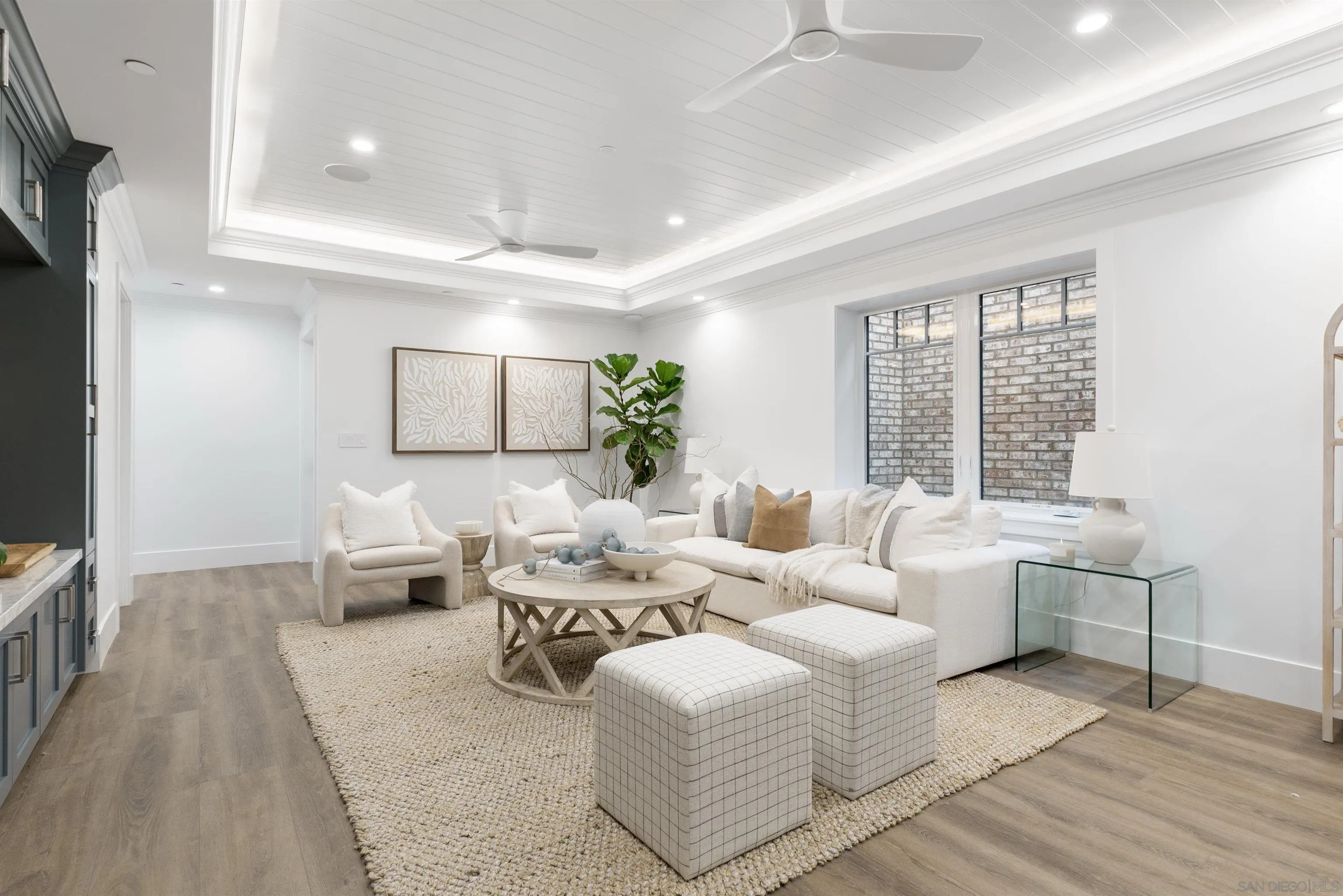 462 Westbourne Street La Jolla, CA 92037 - Photo 57 of 75 a living room with furniture and large windows