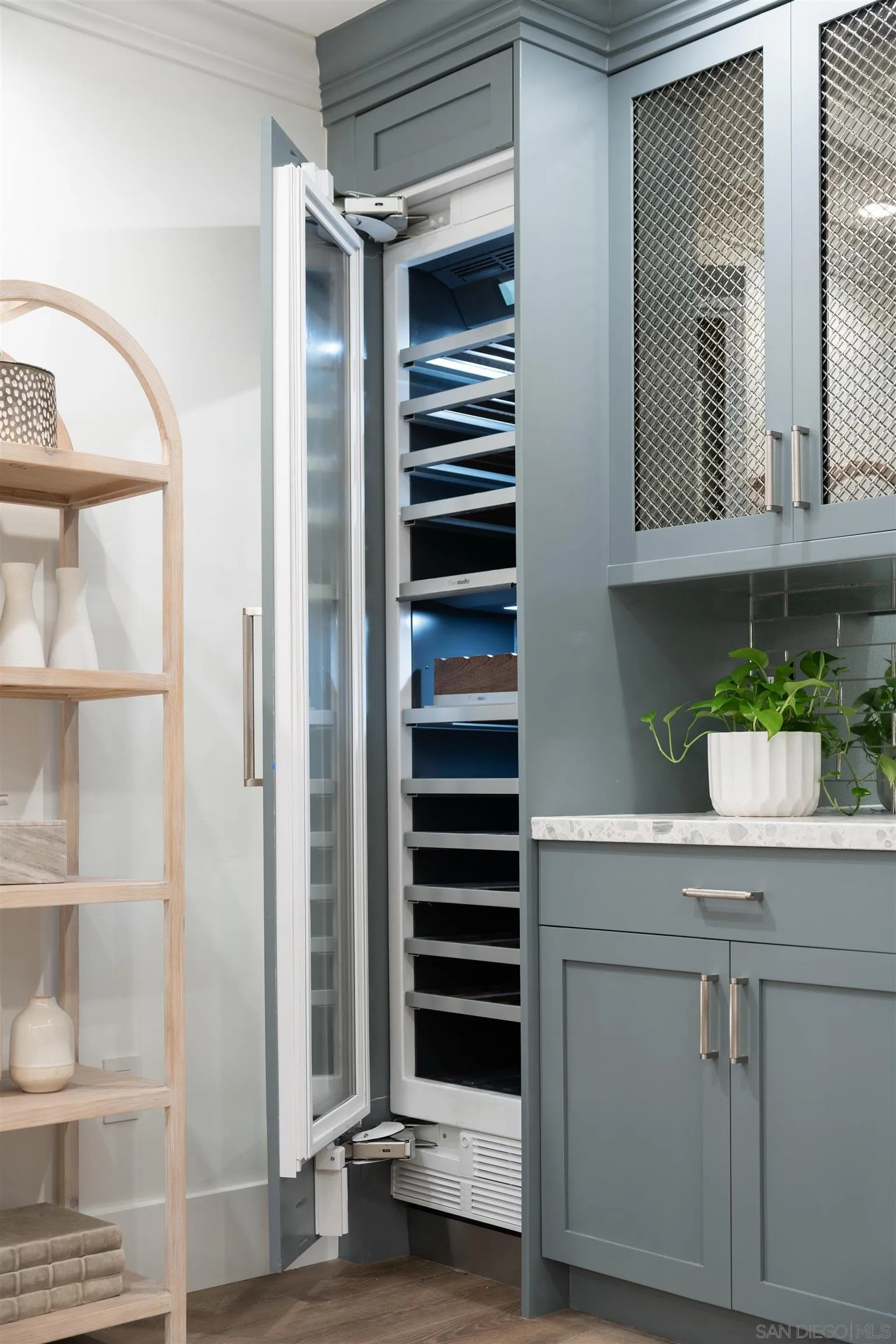 462 Westbourne Street La Jolla, CA 92037 - Photo 60 of 75 a kitchen with a refrigerator and a sink