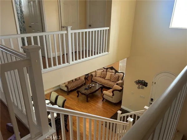 a view of a balcony with chairs