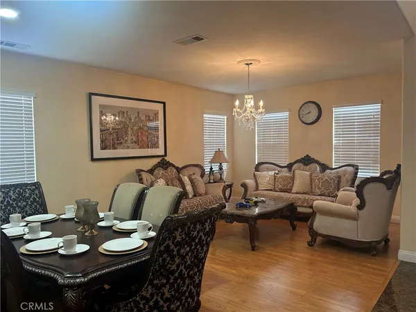a living room with furniture and a table