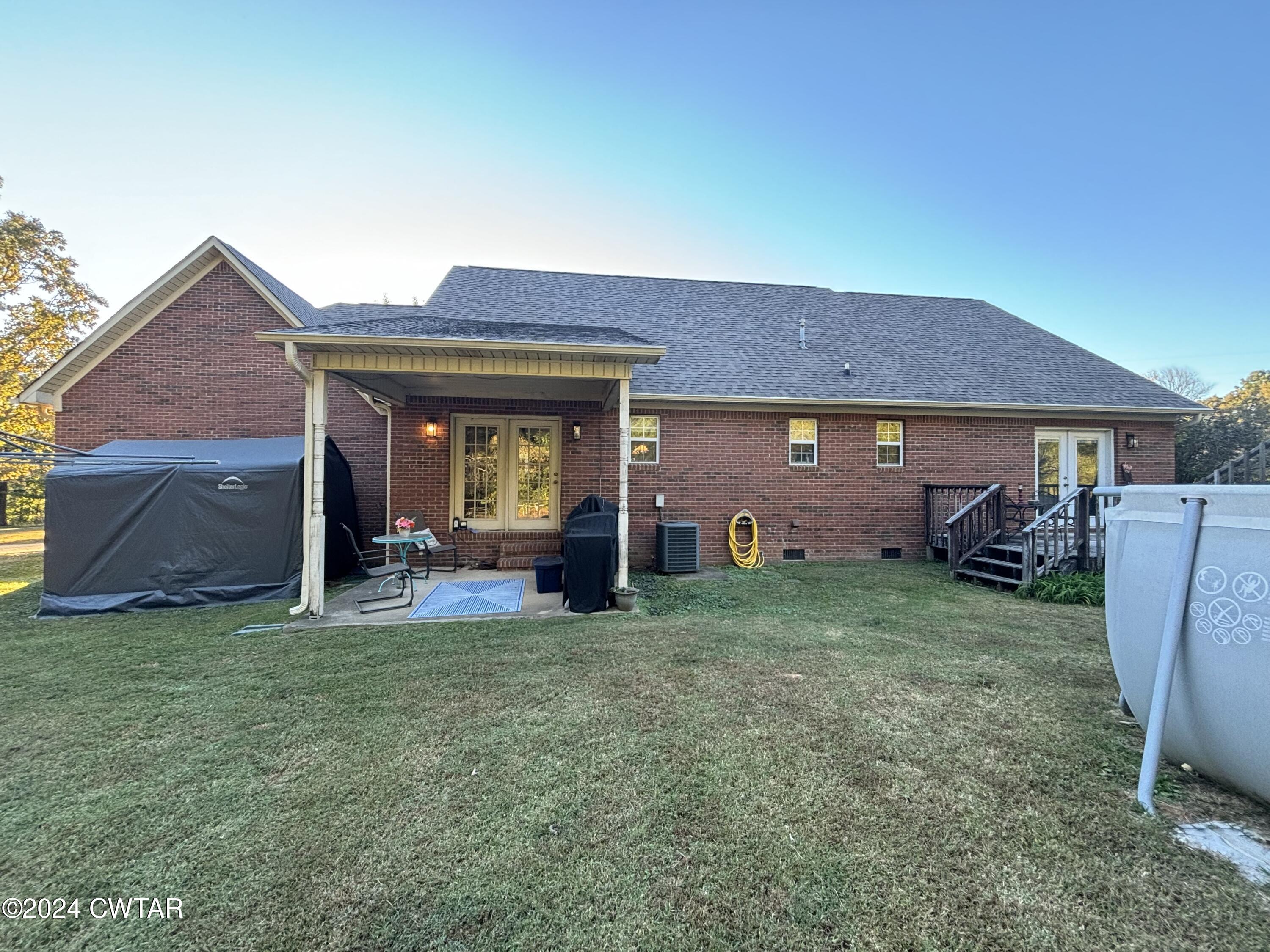 3100 Black Bottom Road Lexington, TN 38351 - Photo 4 of 16 a view of a house with a yard and sitting area