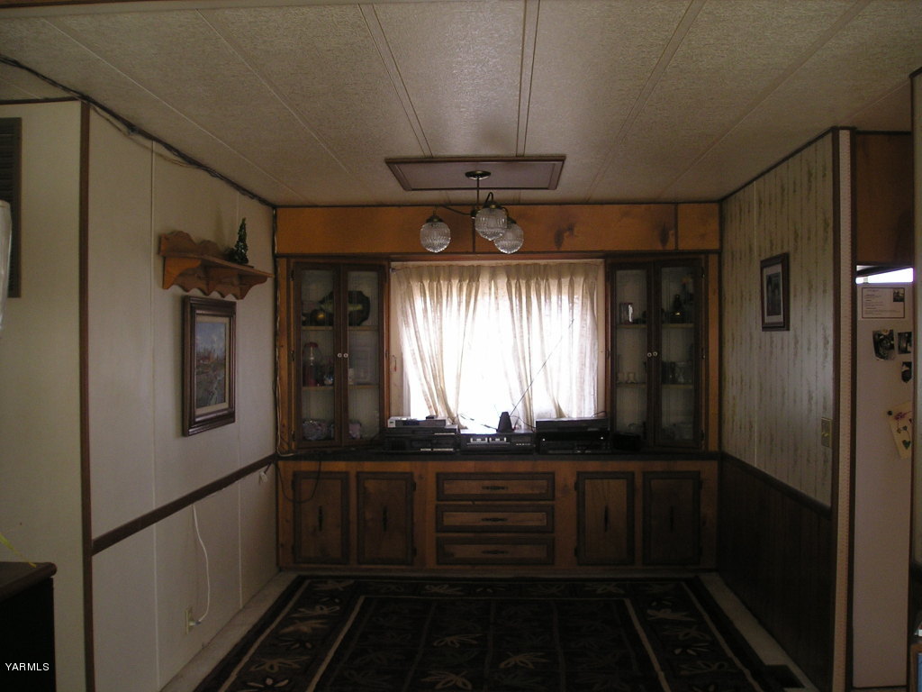 2681 Rosenkranz Road Tieton, WA 98947 - Photo 10 of 11 a kitchen with a refrigerator and a window