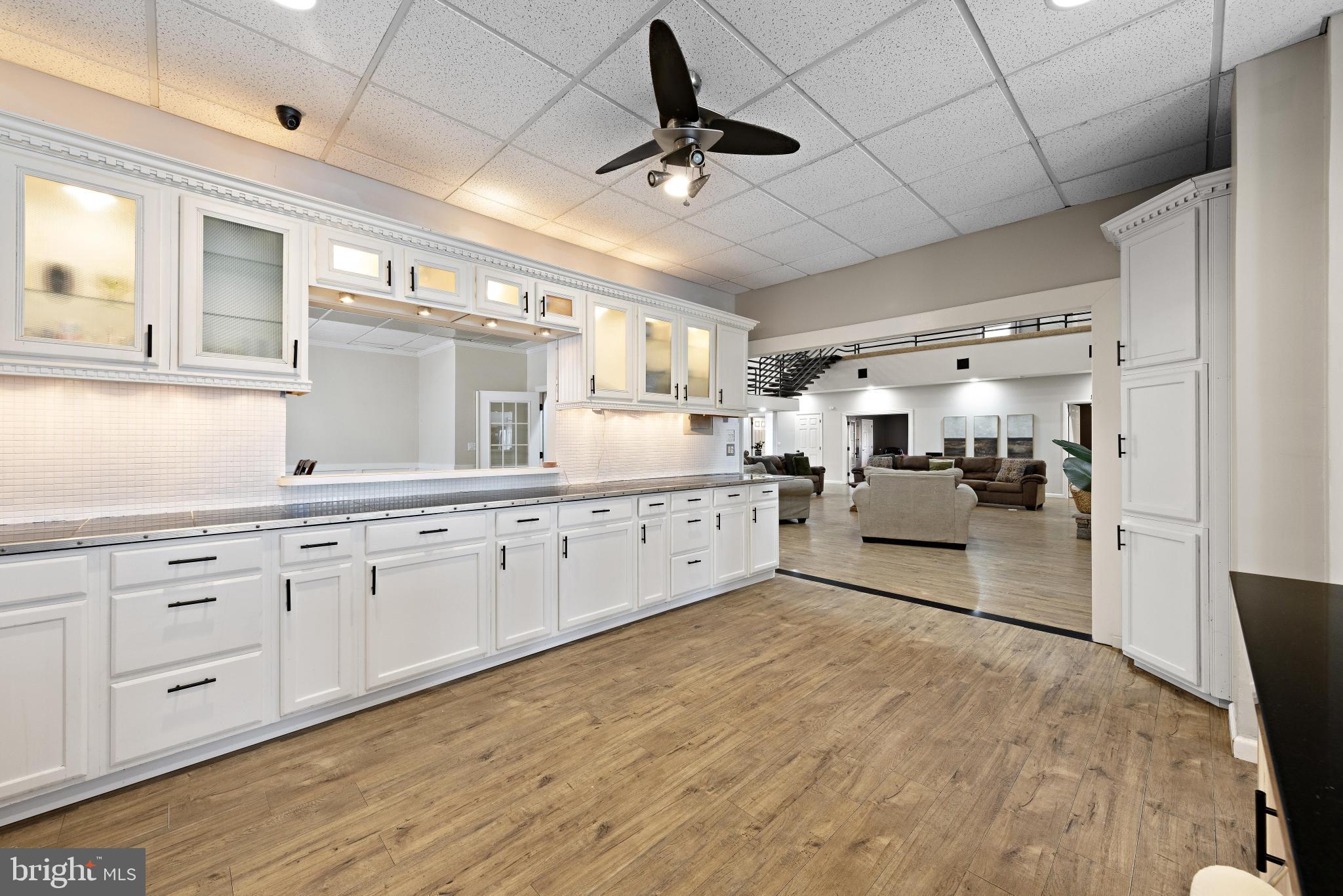 77 West Greenbush Road Tuckerton, NJ 08087 - Photo 19 of 75 a large white kitchen with a large window stainless steel appliances and cabinets