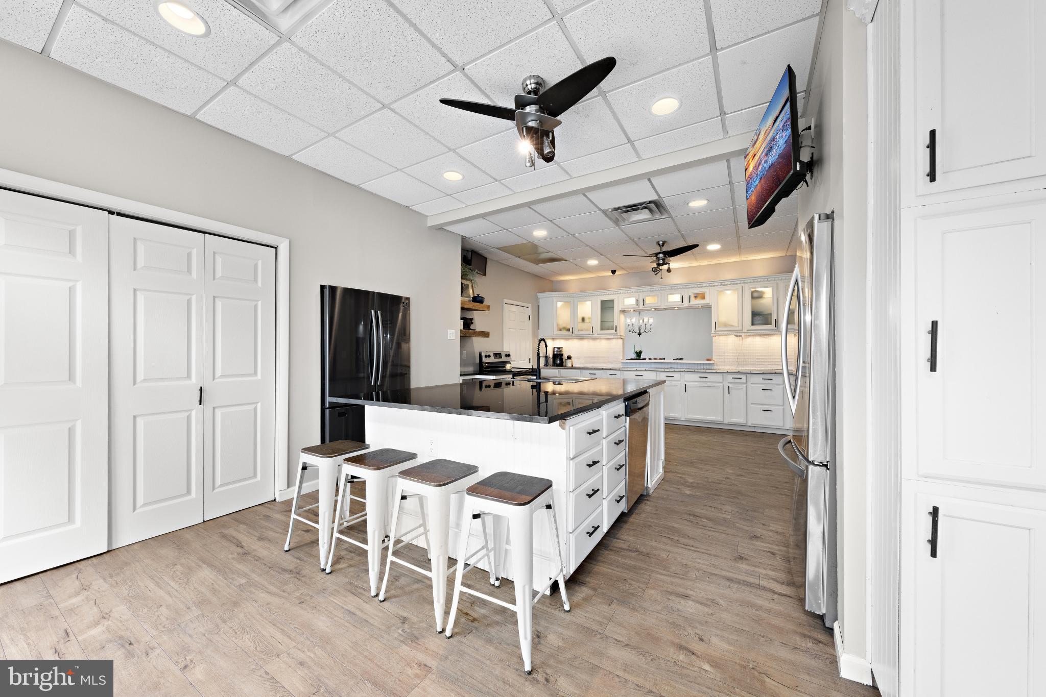 77 West Greenbush Road Tuckerton, NJ 08087 - Photo 20 of 75 a large kitchen with a table and chairs