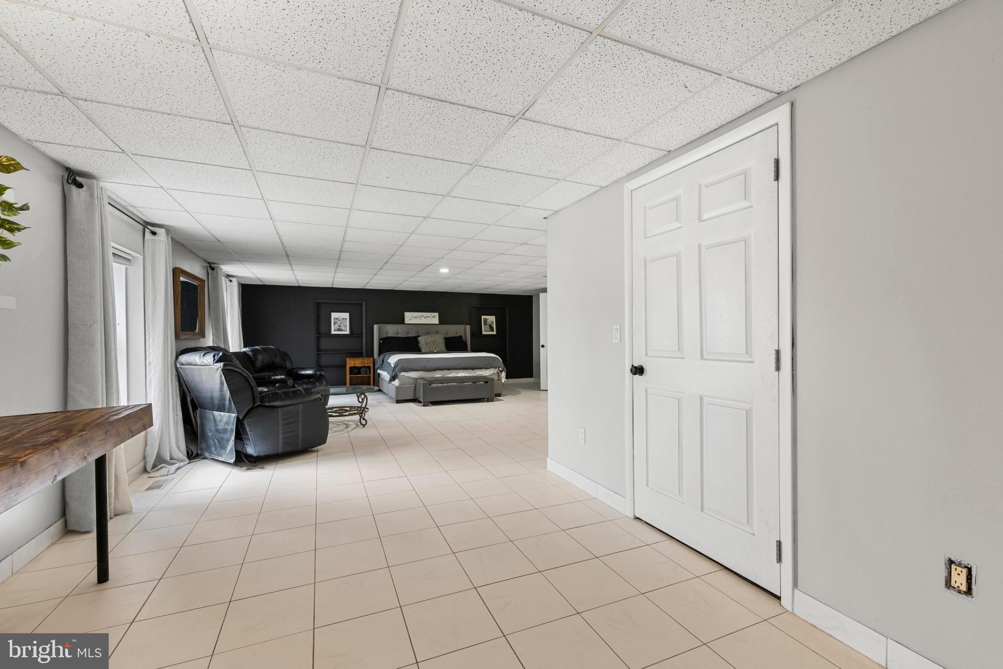 77 West Greenbush Road Tuckerton, NJ 08087 - Photo 33 of 75 a living room with furniture and a chandelier
