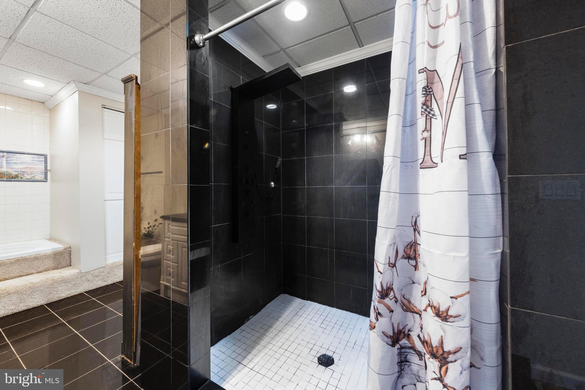 77 West Greenbush Road Tuckerton, NJ 08087 - Photo 35 of 75 a bathroom with a bathtub and shower