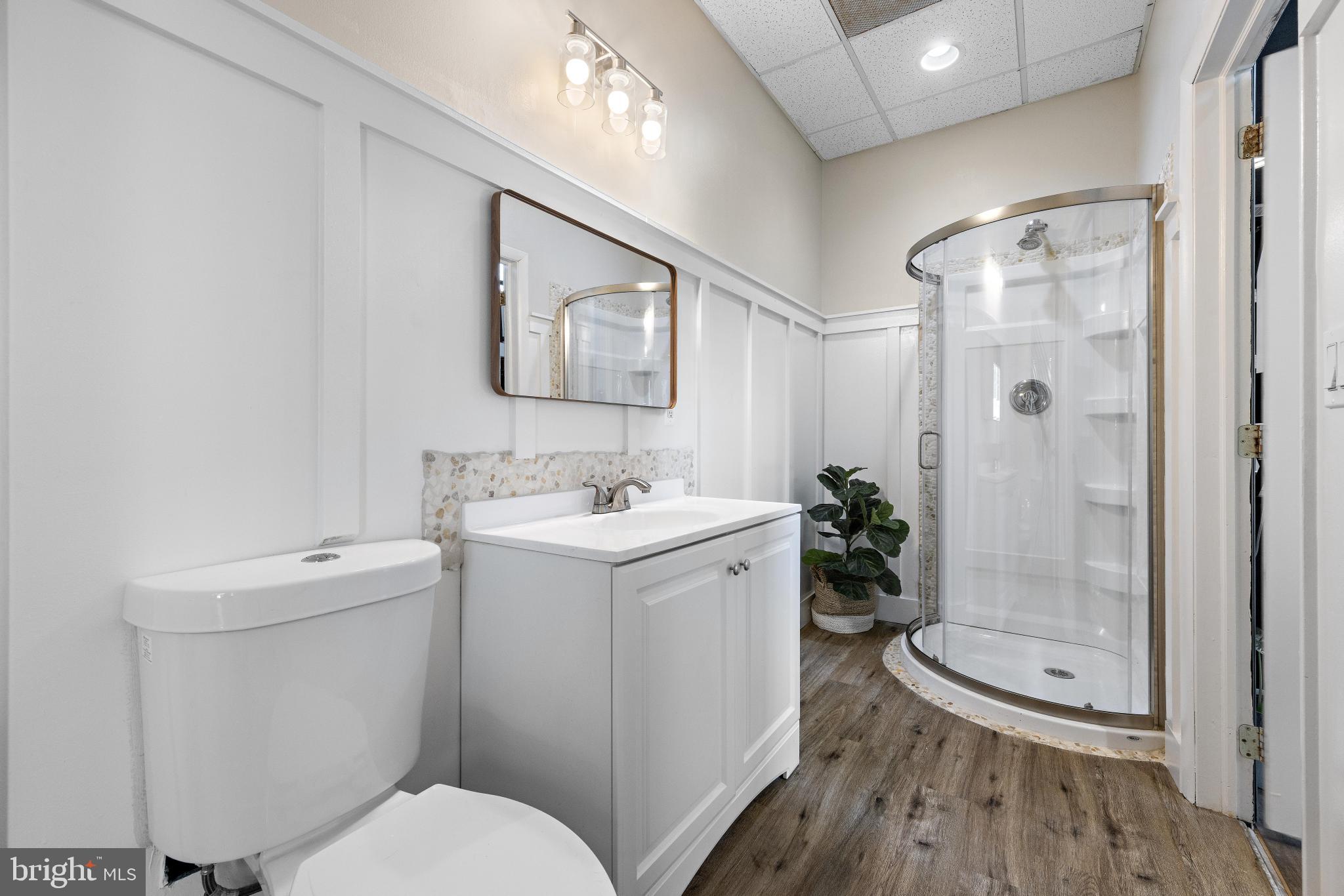 77 West Greenbush Road Tuckerton, NJ 08087 - Photo 41 of 75 a bathroom with a toilet sink and shower