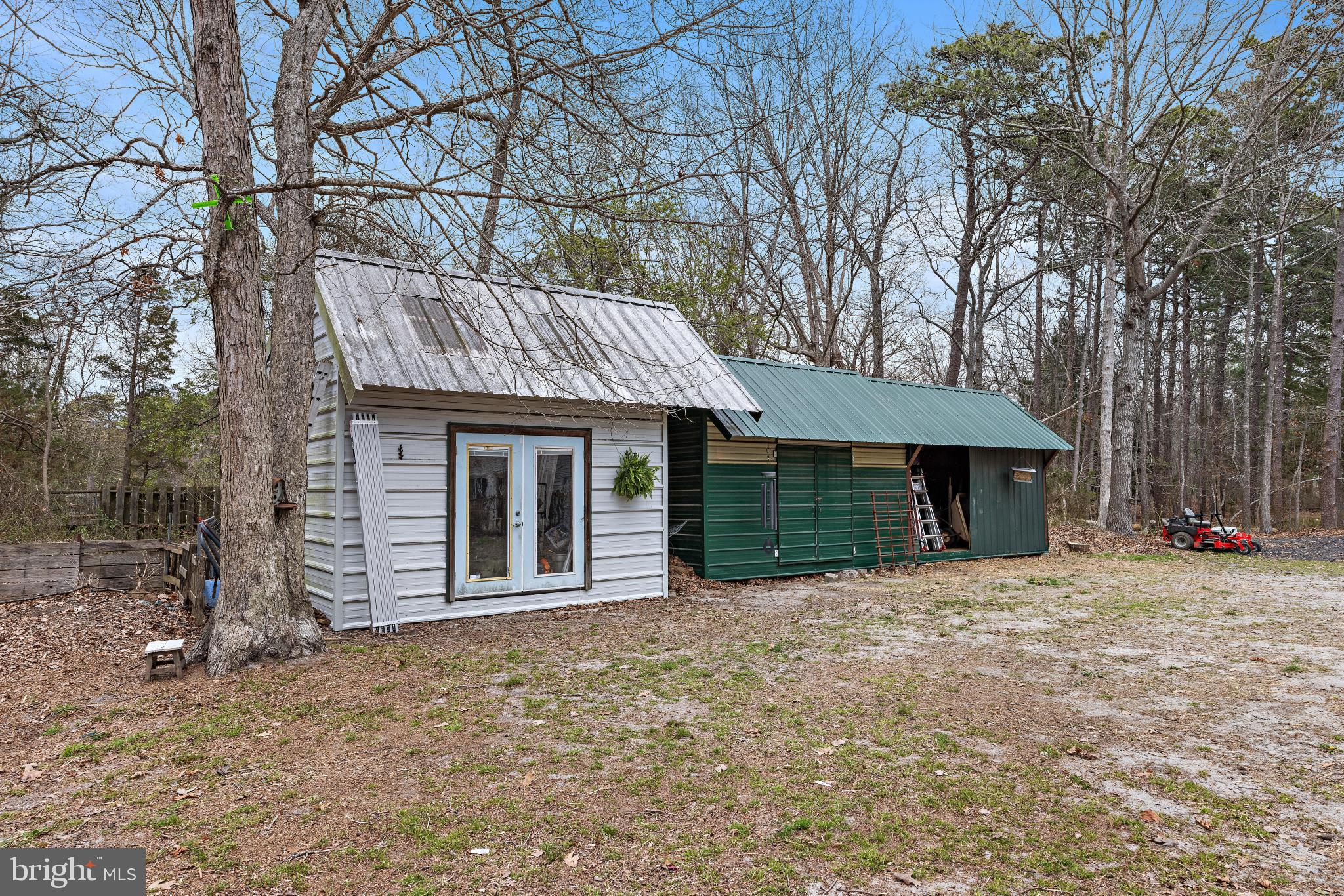 77 West Greenbush Road Tuckerton, NJ 08087 - Photo 65 of 75 a front view of a house with a garden
