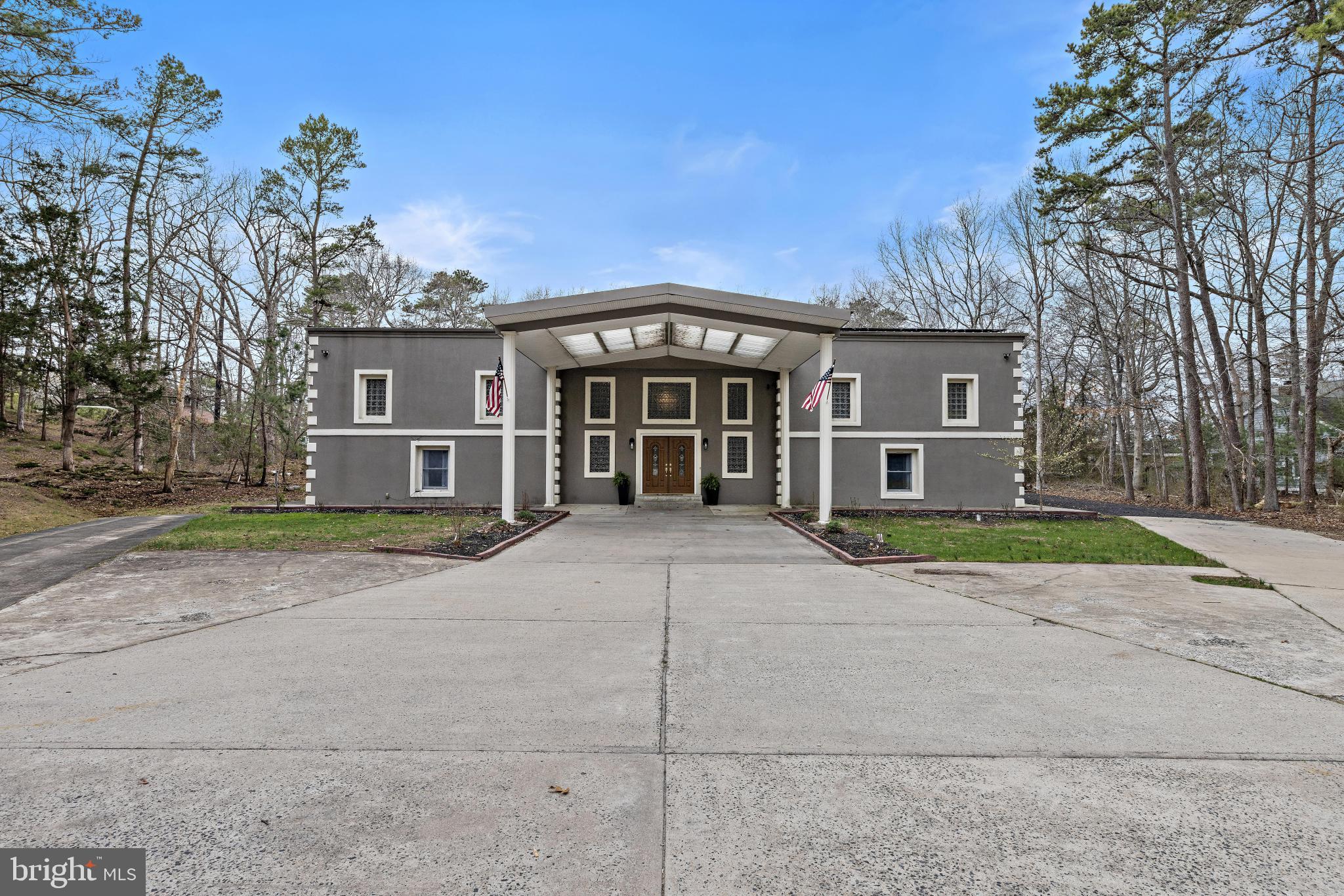 77 West Greenbush Road Tuckerton, NJ 08087 - Photo 71 of 75 front view of a house with a yard